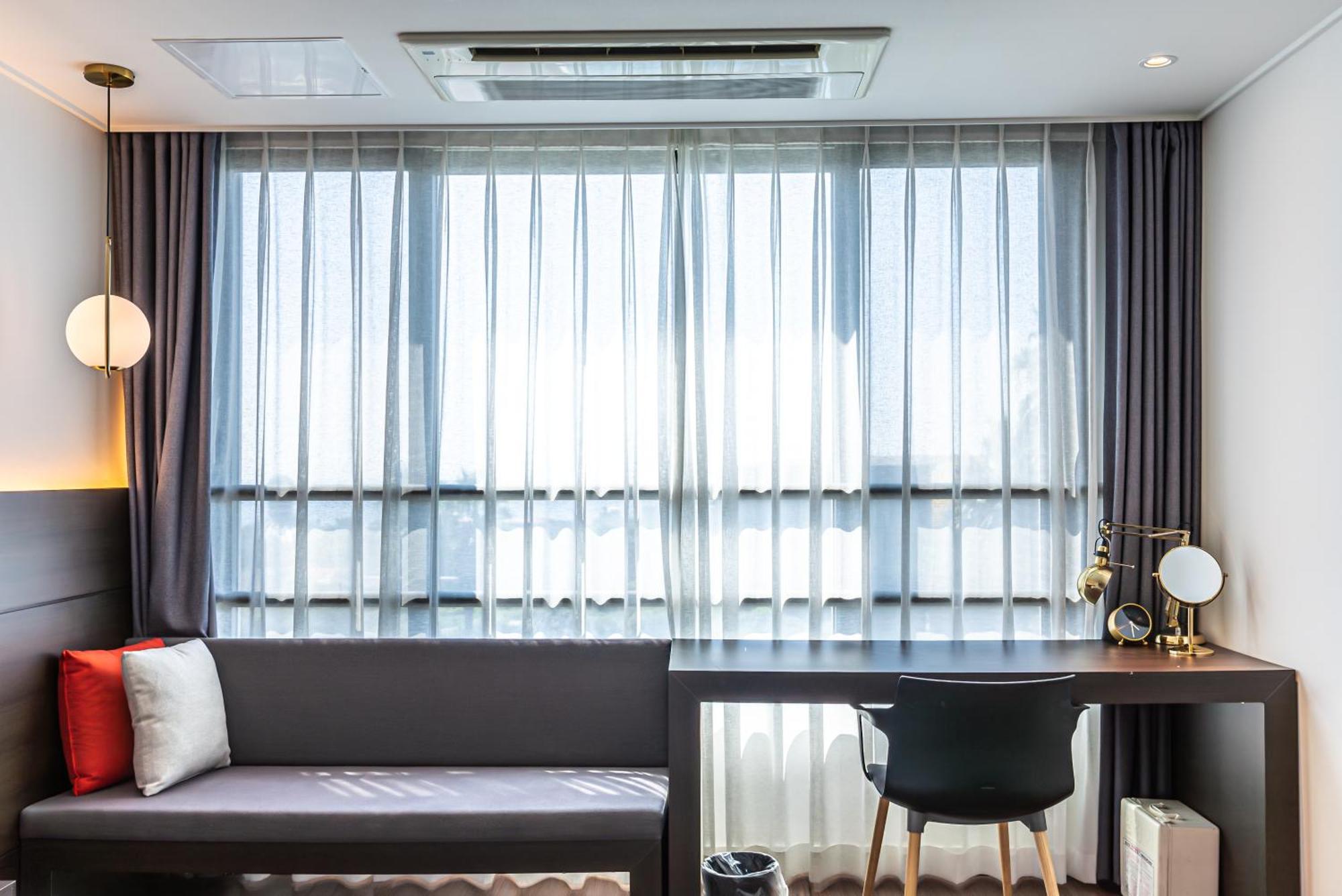 Hotel The Grang Jungmun Seogwipo Esterno foto