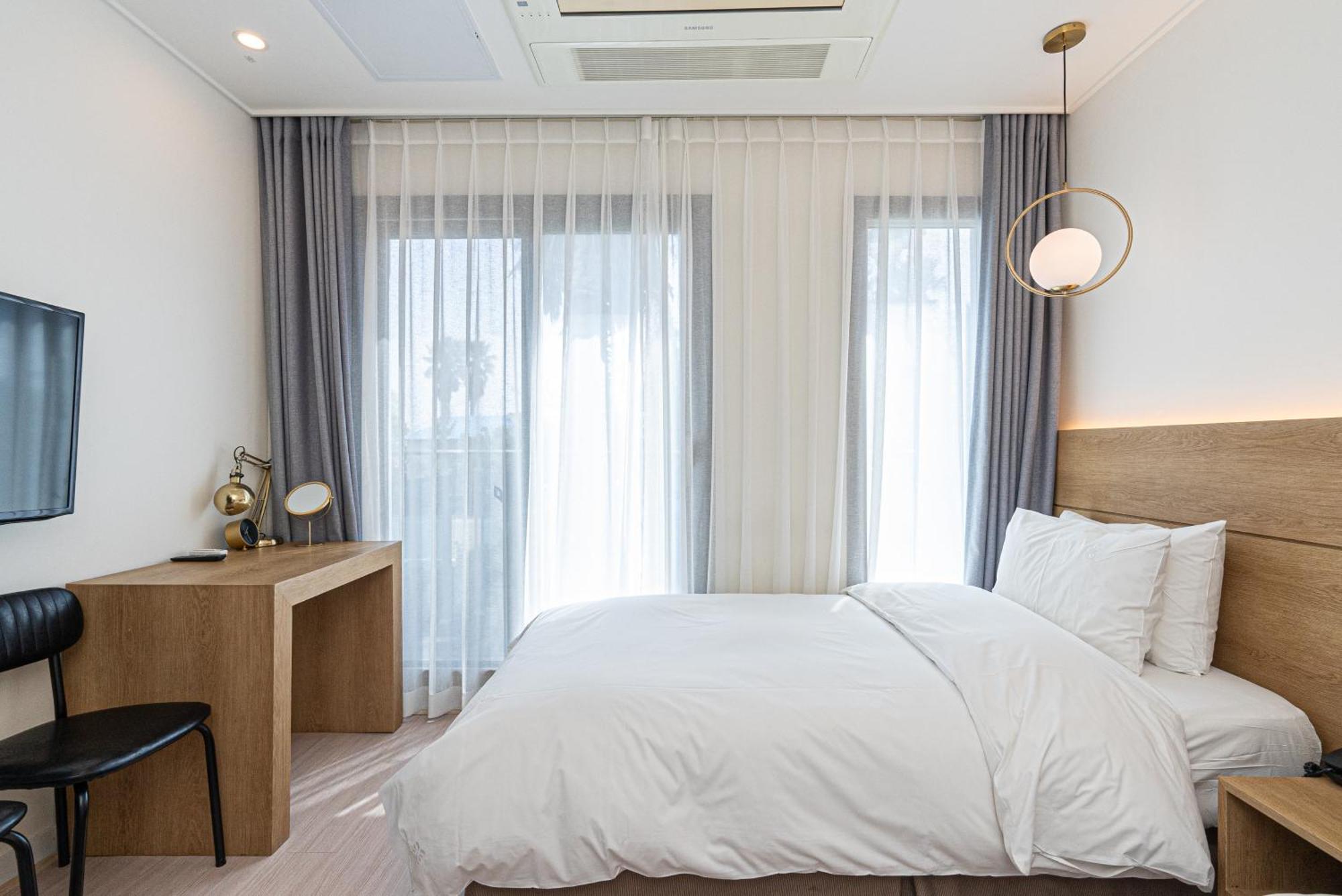 Hotel The Grang Jungmun Seogwipo Esterno foto
